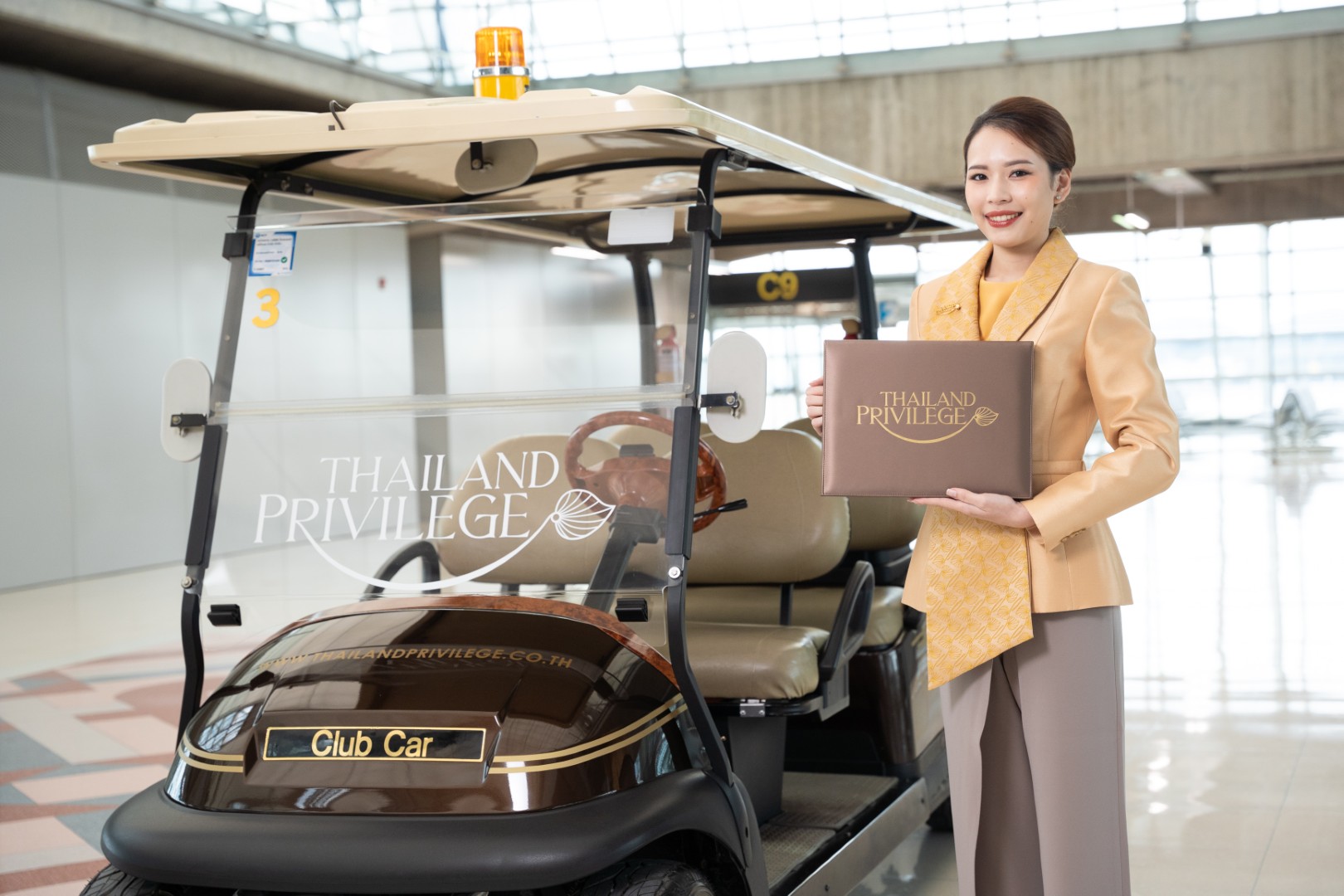 Thailand Privilege Elite Personal Assistant waiting with an electric cart at the arrival gate at Suvarnabhumi airport